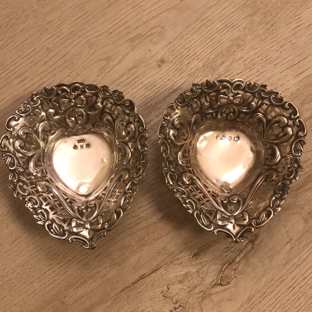A set of antique sterling silver candy trays